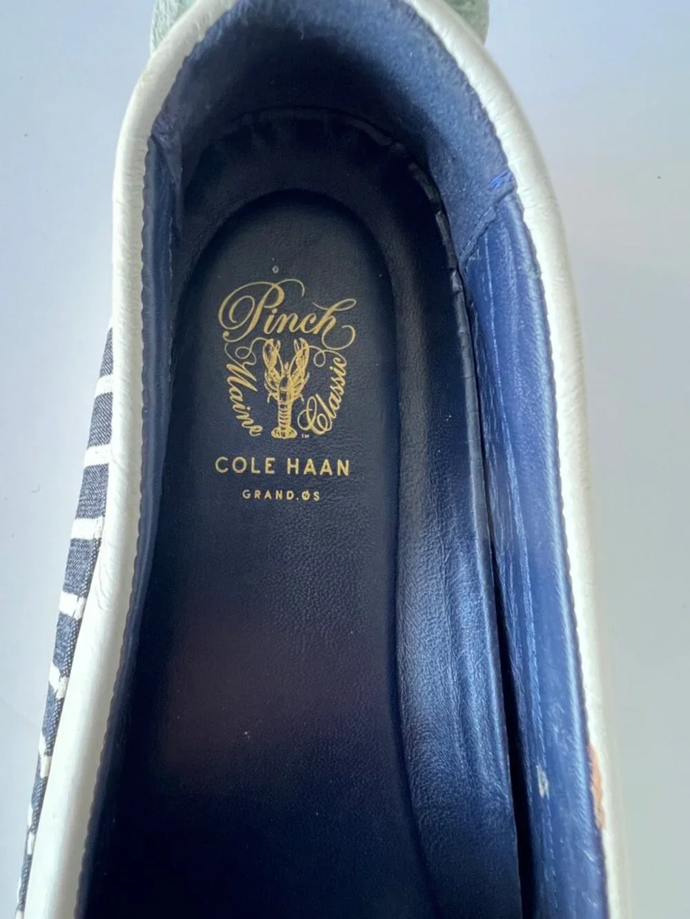 Cole Haan textile signs pinch